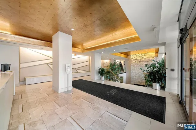 a view of a balcony with wooden floor and stairs