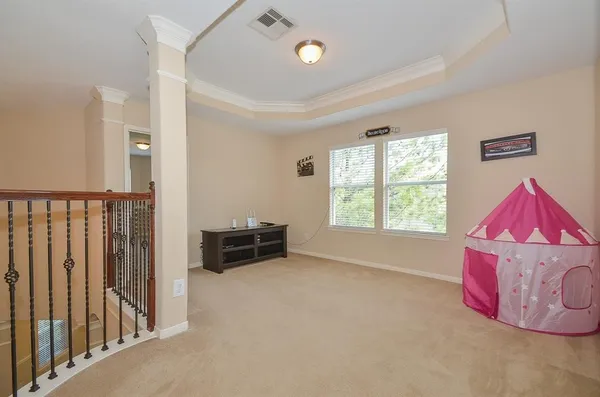 a view of livingroom with furniture and windows