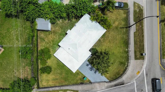 an aerial view of a house having yard