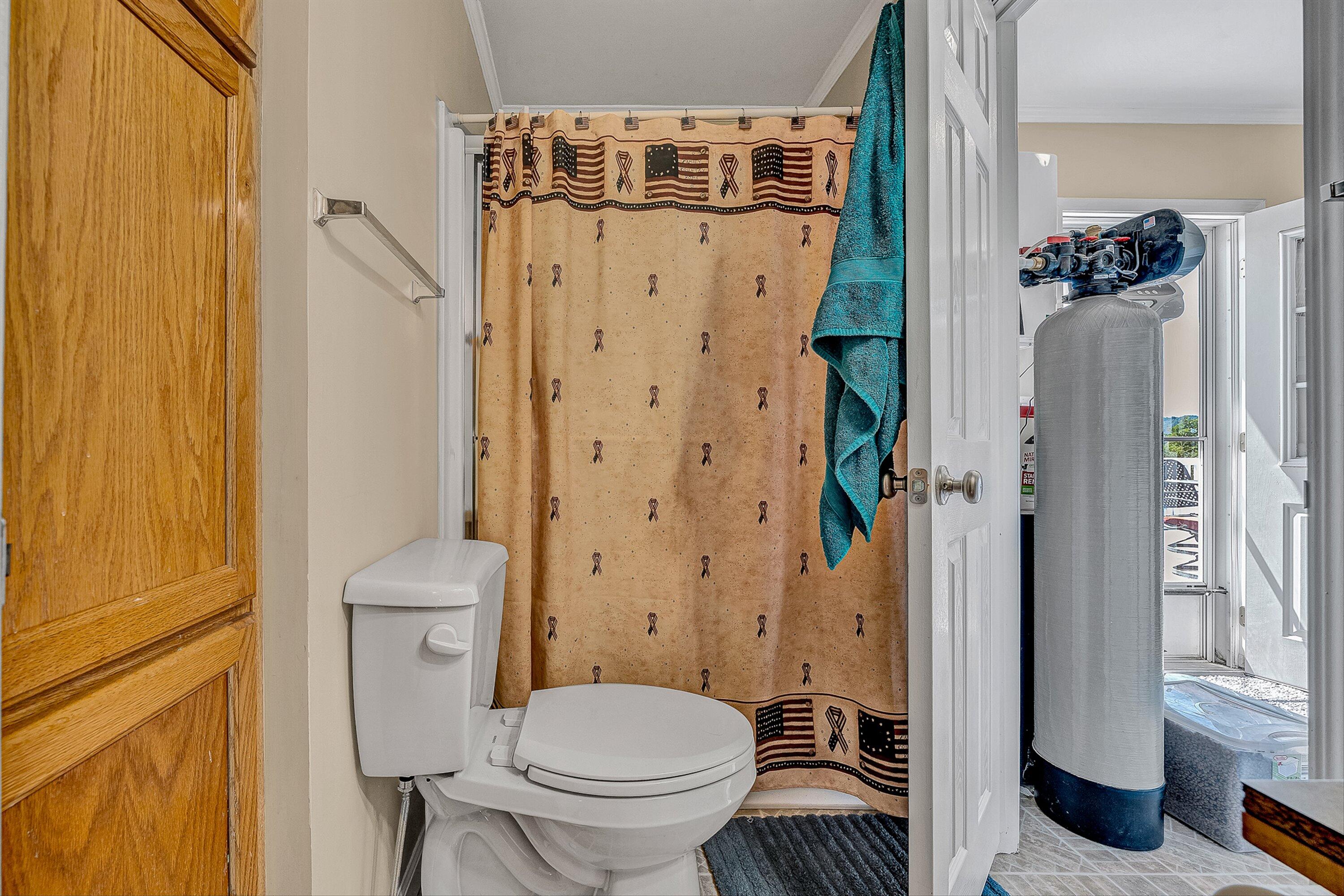 159 Simmons Creek Road Union Hall, VA 24176 - Photo 27 of 55 a bathroom with a toilet and a shower