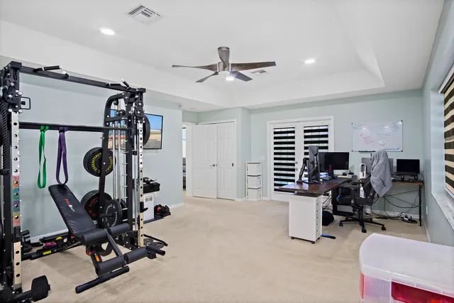 a view of a room with gym equipment