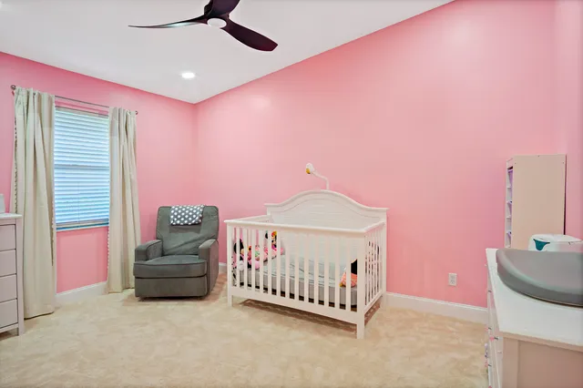 a bed room with a bed and a couch