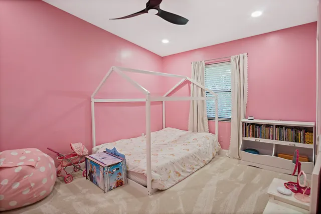 a bedroom with furniture and a bed