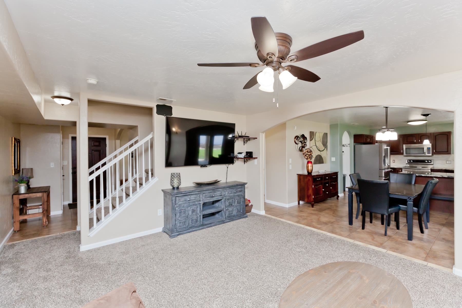 718 Sabil Drive Fruita, CO 81521 - Photo 8 of 35 a view of a livingroom with furniture and windows
