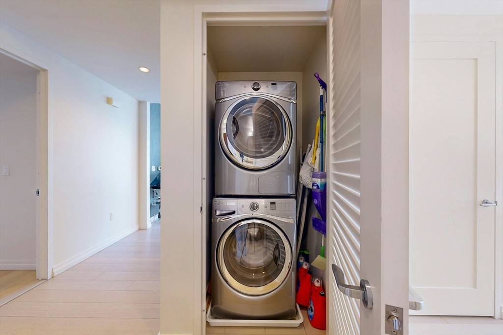 1 Franklin Street, Unit 2308 Boston, MA 02110 - Photo 26 of 41 a utility room with dryer and washer
