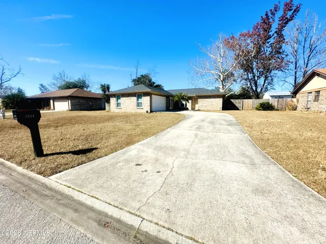 a front view of house with yard