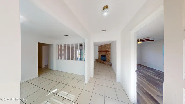 a view of an empty room and window