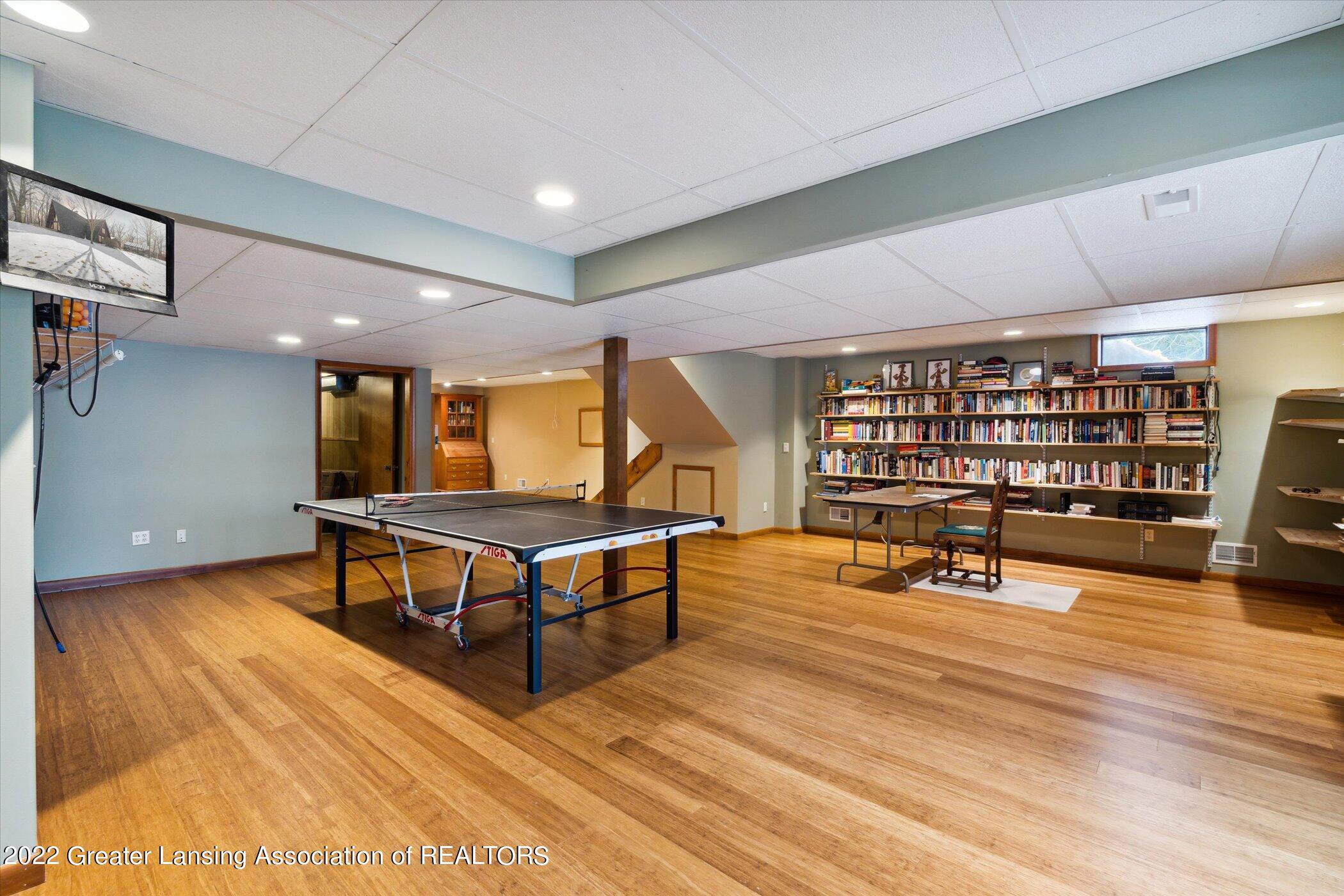 2100 Holt Road Williamston, MI 48895 - Photo 30 of 53 Lower Level Game Room