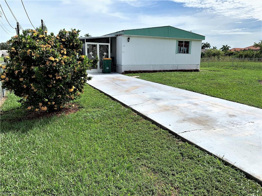 980 Auto Ranch Road, Unit 13 Naples, FL 34114 - Photo 2 of 16 Gallery Image 2
