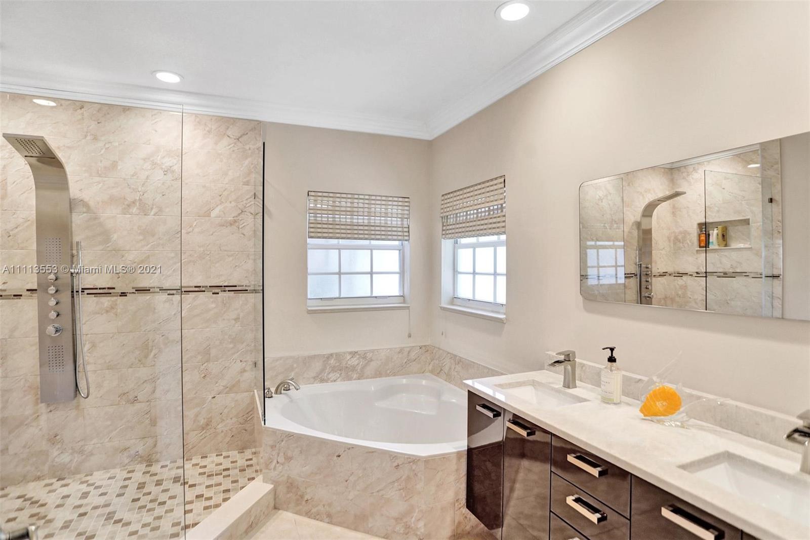 15816 Southwest 103rd Lane Miami, FL 33196 - Photo 19 of 49 a bathroom with a granite countertop sink and a tub