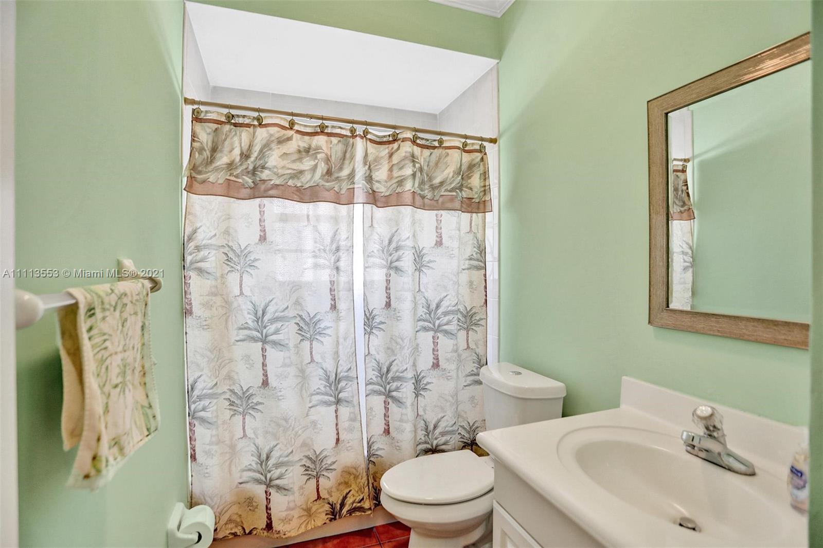 15816 Southwest 103rd Lane Miami, FL 33196 - Photo 25 of 49 a bathroom with a sink and toilet