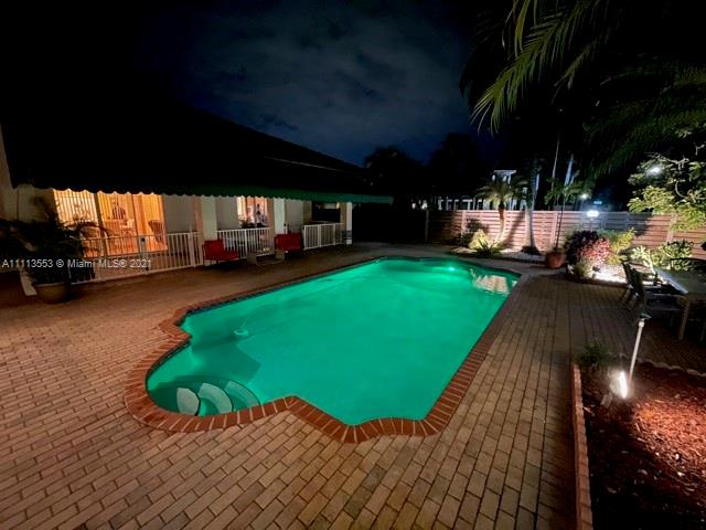 15816 Southwest 103rd Lane Miami, FL 33196 - Photo 34 of 49 a view of a backyard with sitting area