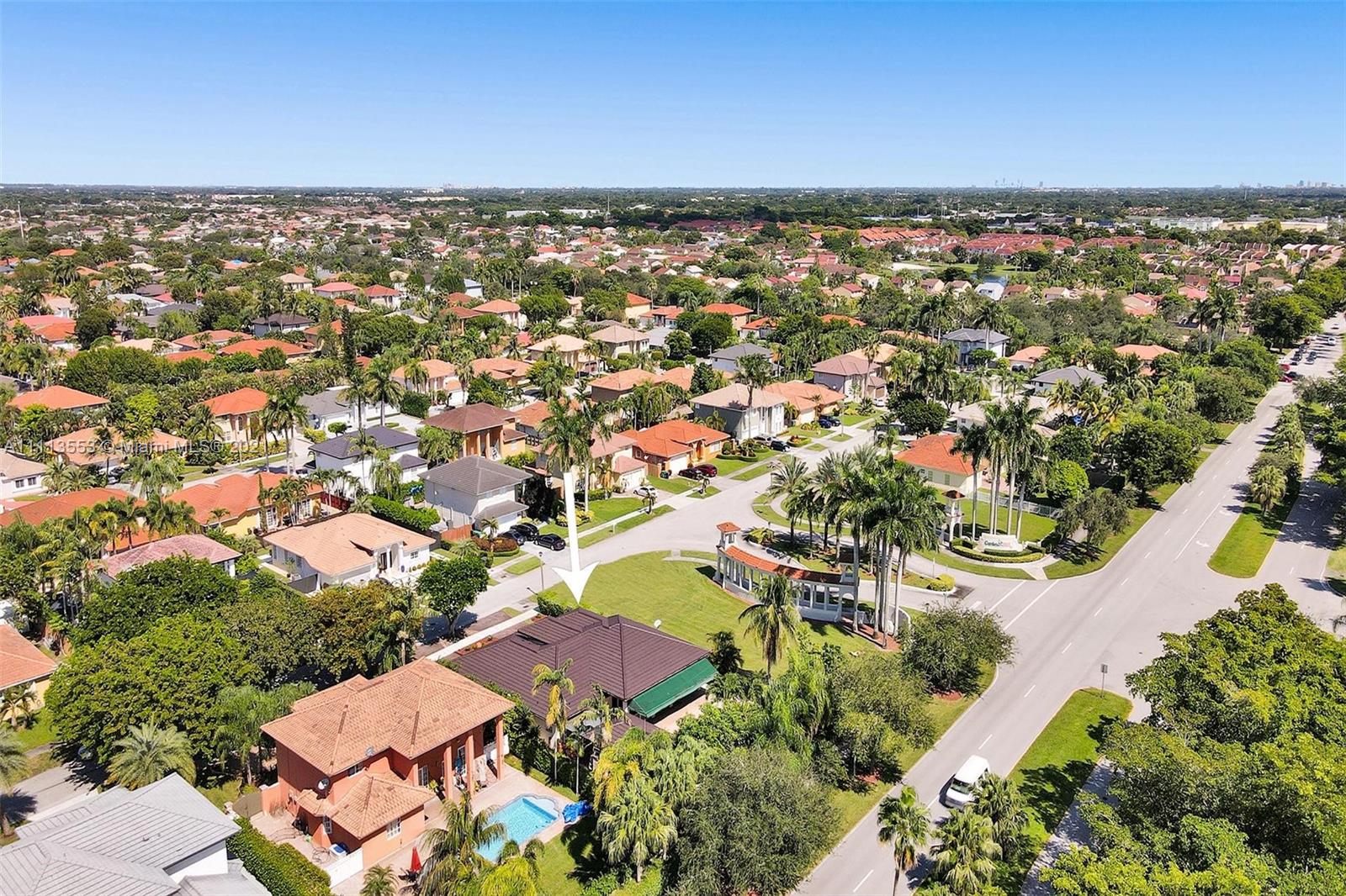 15816 Southwest 103rd Lane Miami, FL 33196 - Photo 47 of 49 an aerial view of residential houses with outdoor space