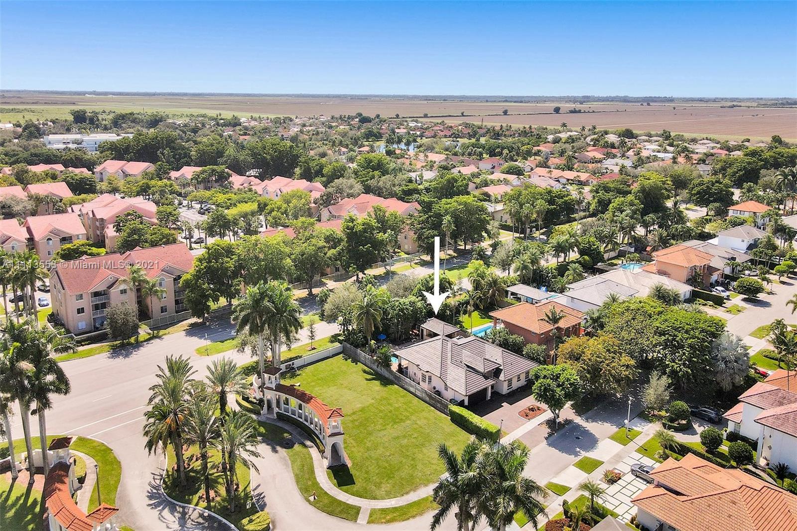 15816 Southwest 103rd Lane Miami, FL 33196 - Photo 48 of 49 an aerial view of residential houses with outdoor space