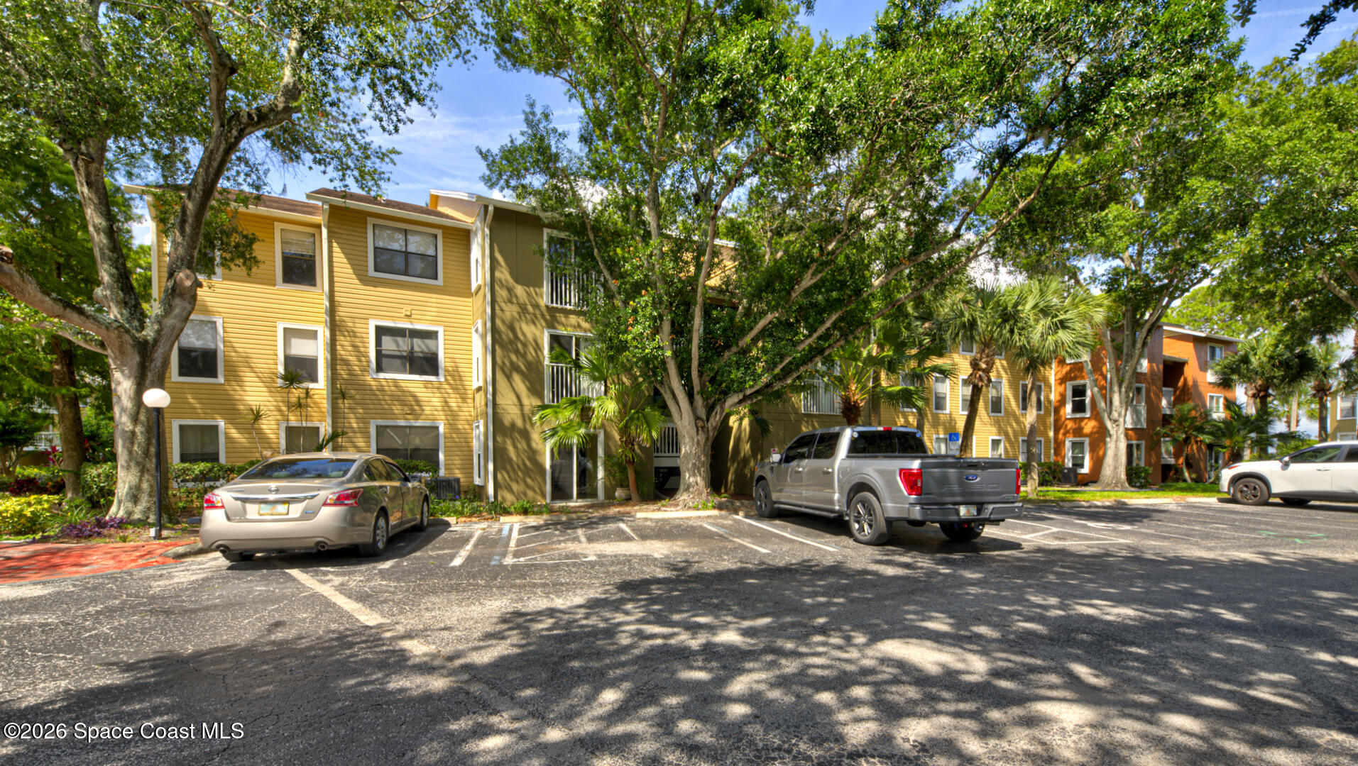 225 South Tropical Trail, Unit 605 Merritt Island, FL 32952 - Photo 33 of 36 Sunset Bay 600 building front