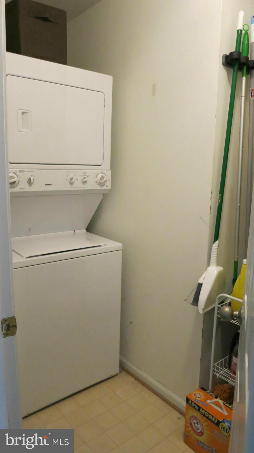 1423 Church Hill Place, Unit 1423 Reston, VA 20194 - Photo 12 of 26 a utility room with dryer and washer