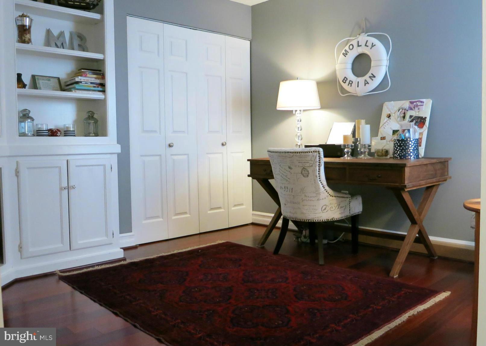 1423 Church Hill Place, Unit 1423 Reston, VA 20194 - Photo 9 of 26 a view of a dining room with furniture and wooden floor