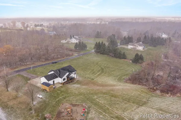 $559,900 | 21650 Centennial Drive, Conklin, MI 49403
