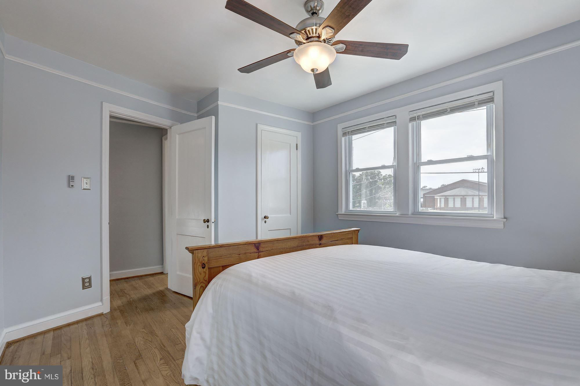 6513 3rd Street Northwest Washington, DC 20012 - Photo 16 of 30 a bedroom with a large bed and a window