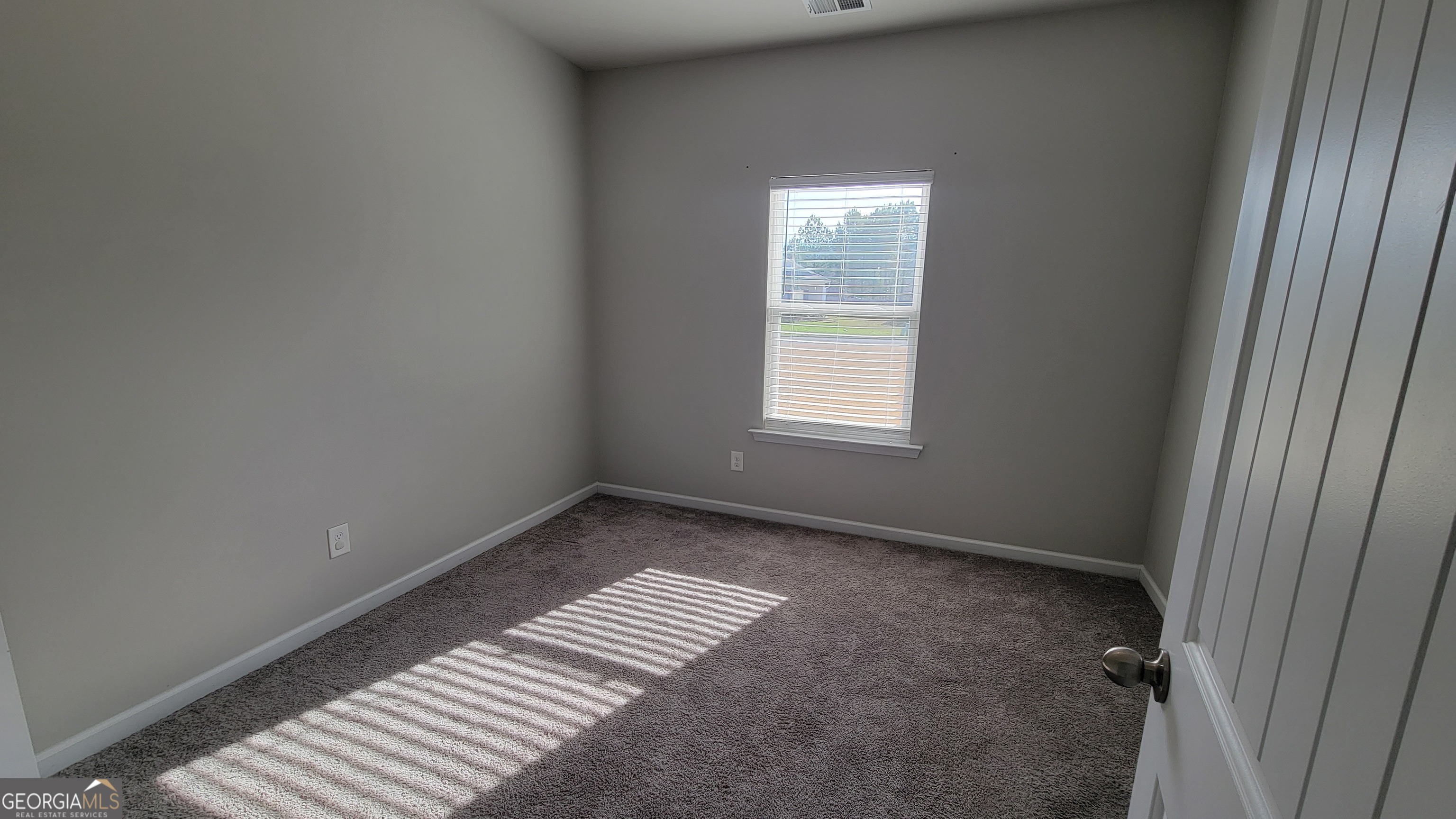 1 Berryrun Drive Rome, GA 30165 - Photo 2 of 23 an empty room with windows