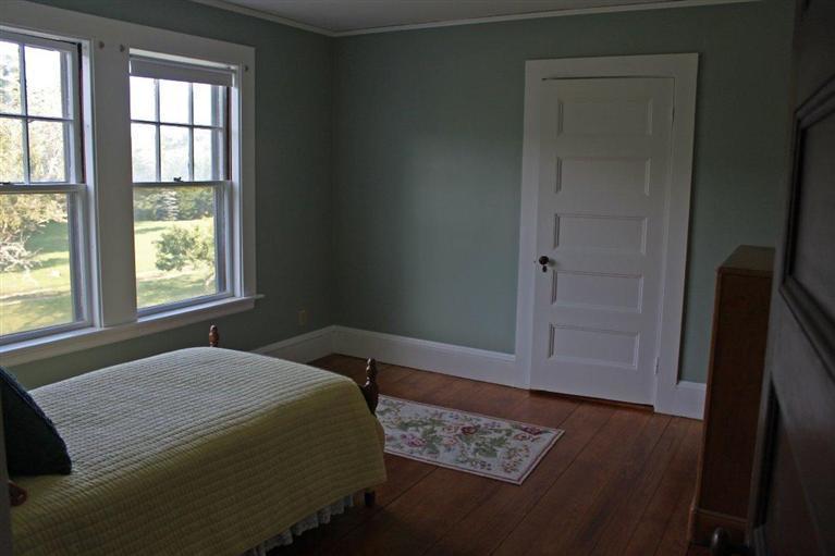 41 Depot Road Cataumet, MA 02534 - Photo 21 of 34 a bedroom with a bed and a window