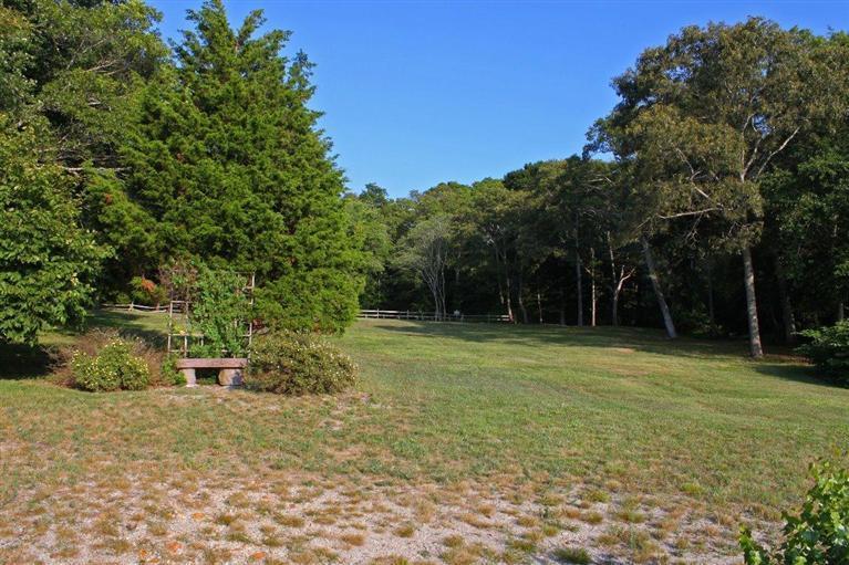 41 Depot Road Cataumet, MA 02534 - Photo 29 of 34 a backyard of a house with lots of green space