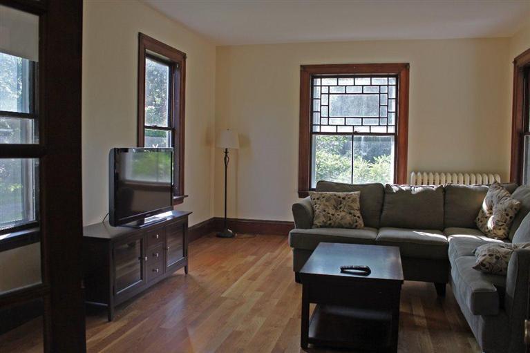 41 Depot Road Cataumet, MA 02534 - Photo 4 of 34 a living room with furniture and a flat screen tv