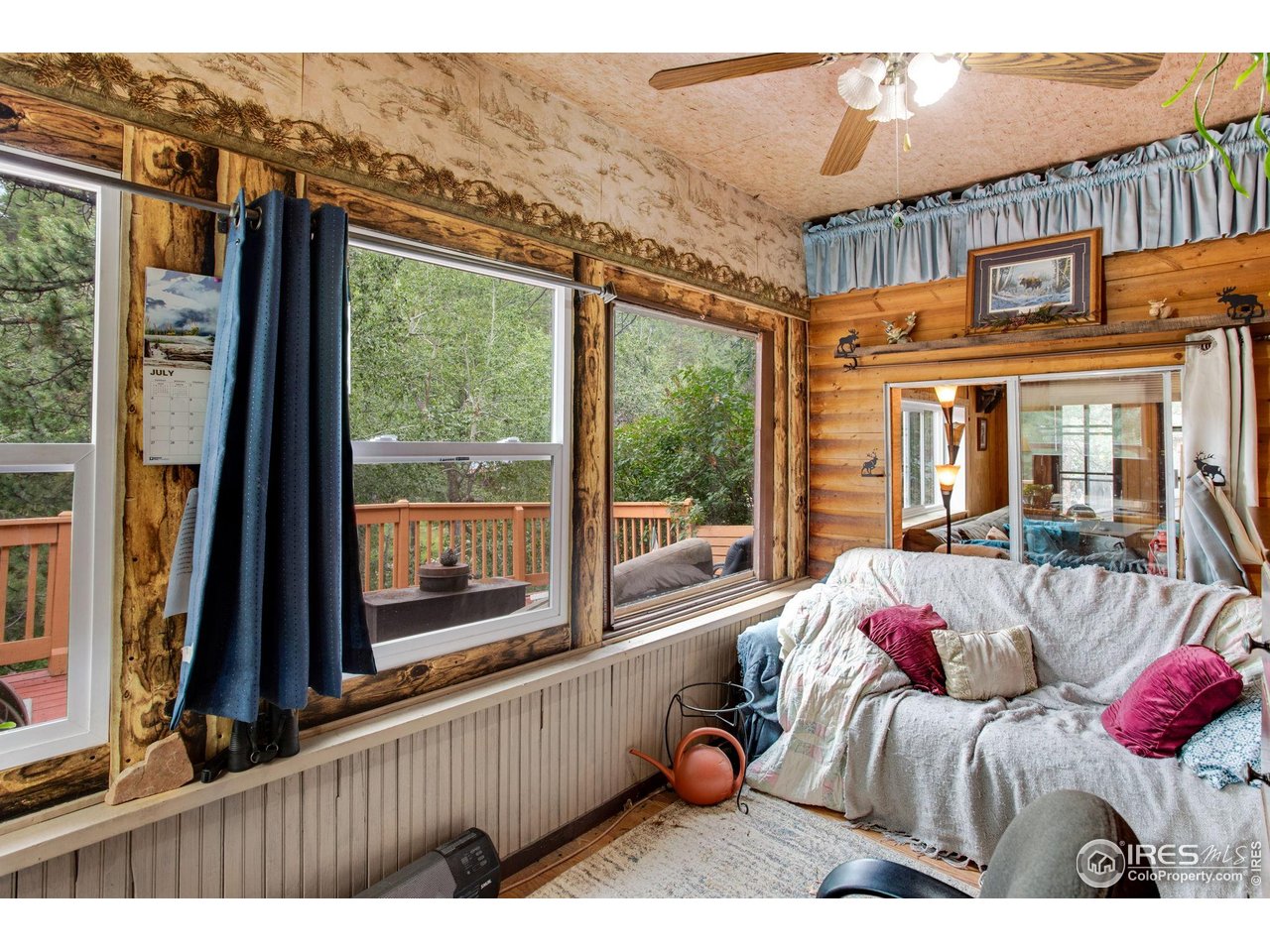 2248 Riverside Drive Lyons, CO 80540 - Photo 18 of 28 a view of a living room and a balcony