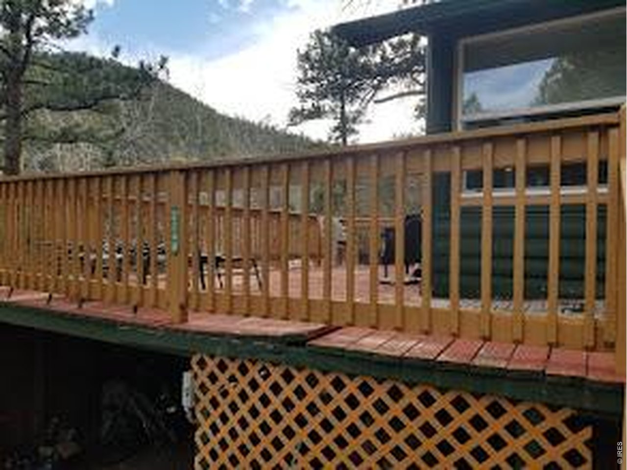 2248 Riverside Drive Lyons, CO 80540 - Photo 29 of 29 a view of a balcony with a swing
