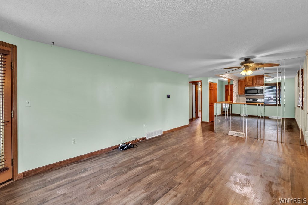 4755 Chestnut Ridge Road, Unit 9 Amherst, NY 14228 - Photo 23 of 46 Dinette/ living room area