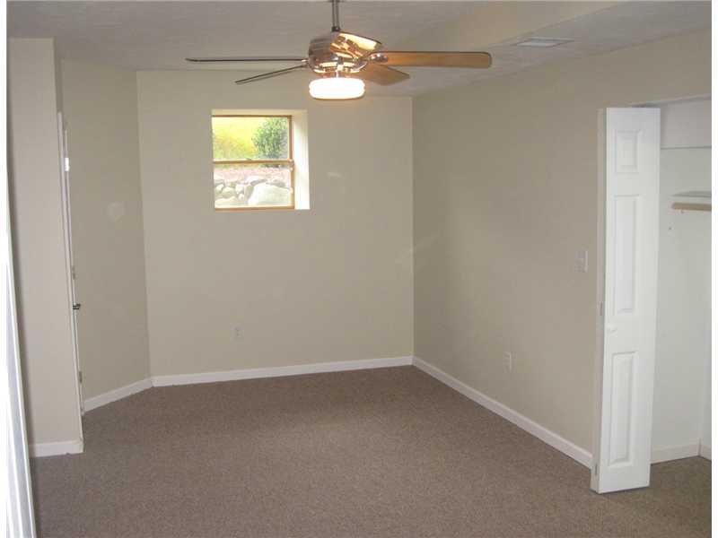 46 Rhodes Street Cumberland, RI 02864 - Photo 24 of 25 Cellar or Basement. Recently finished with new carpets lower level room with bedroom potential and full double closet.