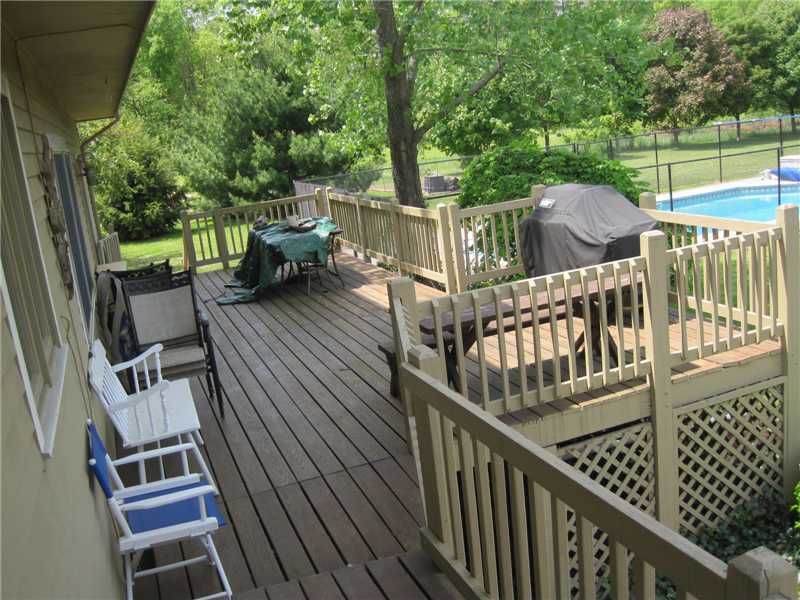 46 Rhodes Street Cumberland, RI 02864 - Photo 3 of 25 Patio/Deck. Large Deck off of the Kitchen.