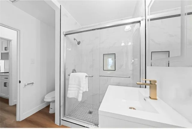 a bathroom with a bathtub and a shower