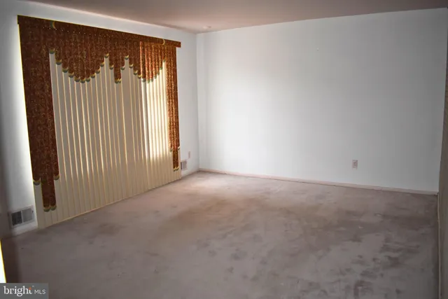 a view of a hallway with entryway