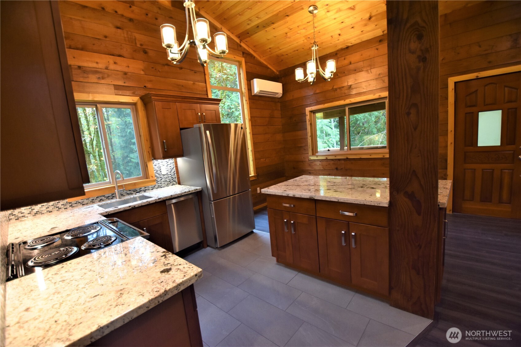 30331 Heimer Road Arlington, WA 98223 - Photo 34 of 37 a kitchen with a sink stove and refrigerator