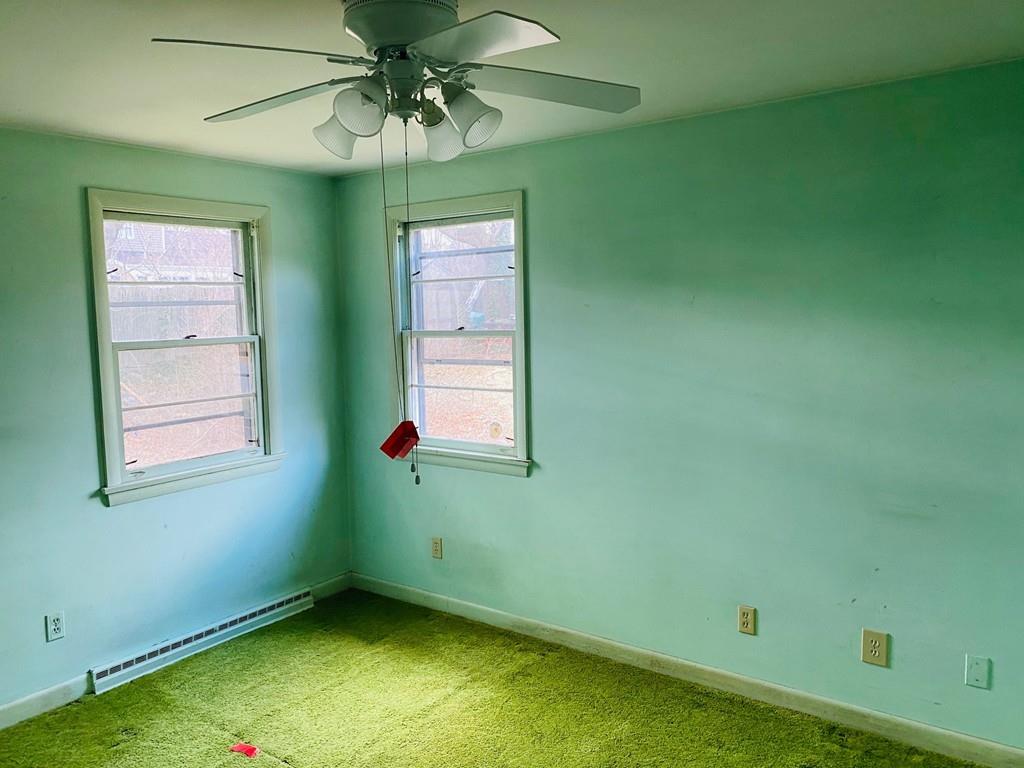 191 Mohawk Road Somerset, MA 02726 - Photo 12 of 19 a room with a window and a ceiling fan