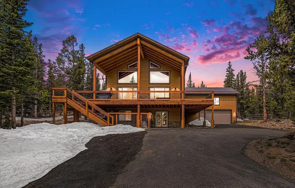 a view of a house with a roof deck