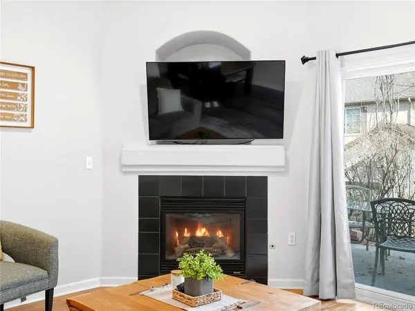 a view of room with window and wooden floor