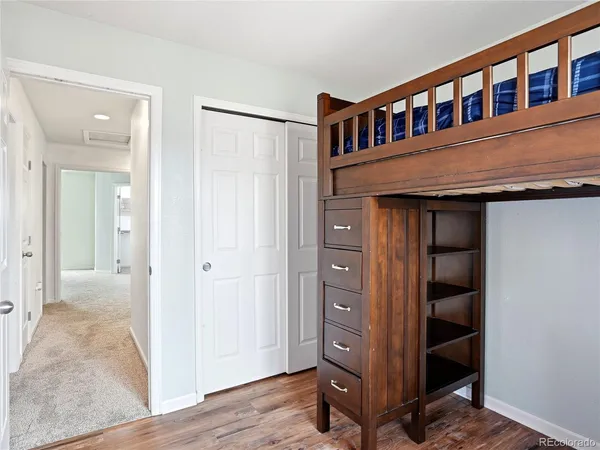 a view of house with a yard