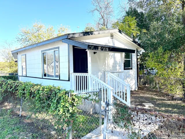 a front view of a house with a porch
