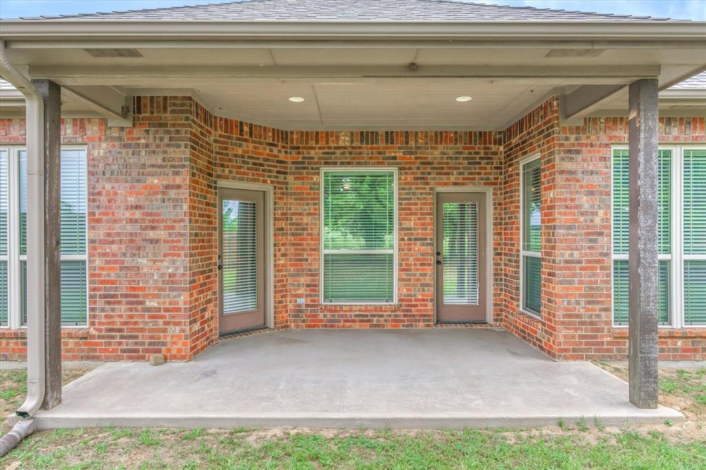 1852 Meadowview Canton, TX 75103 - Photo 23 of 28 a front view of a house with a garage