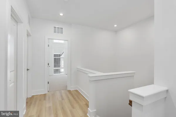 a bathroom with a sink a mirror and a shower