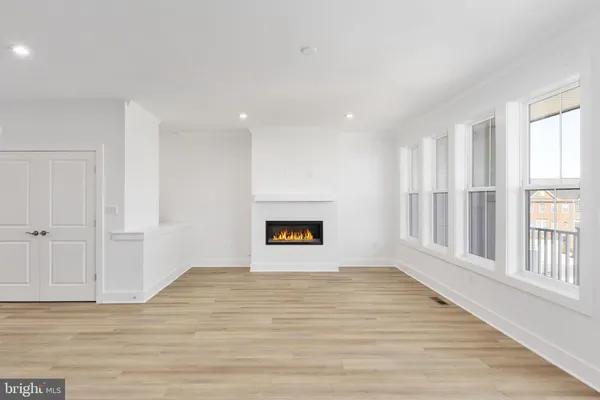 an entryway in a hall with a hallway