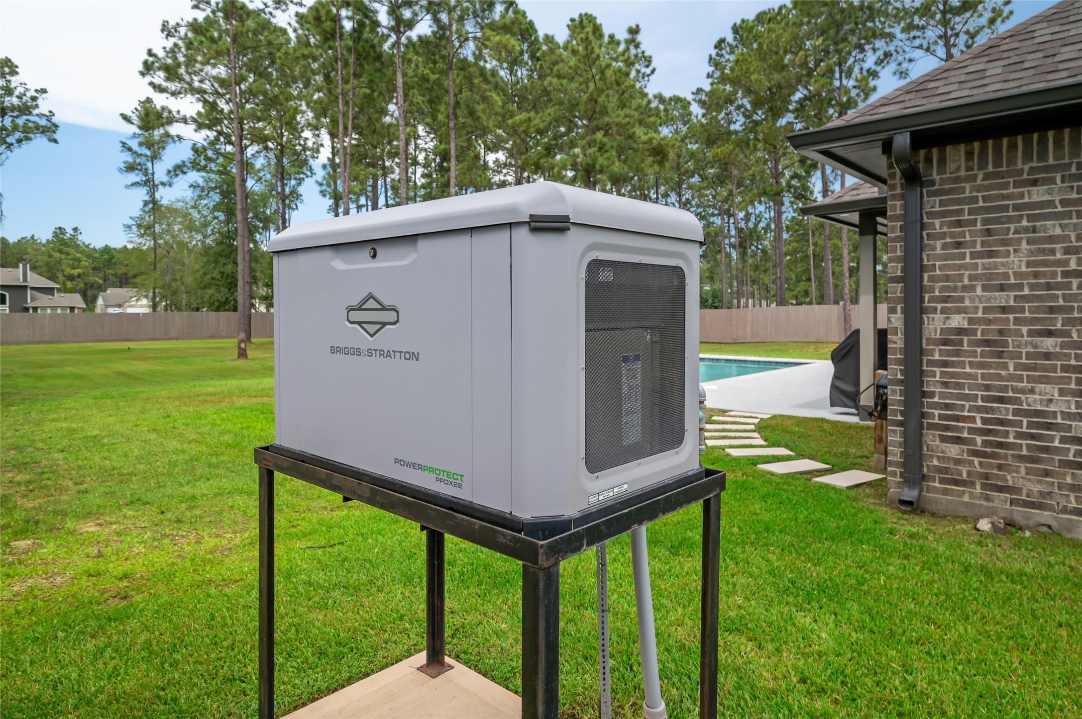 13419 Maverick Trail Road Conroe, TX 77303 - Photo 39 of 49 Whole-home Briggs & Stratton standby generator provides added peace of mind and reliable backup power during outages.