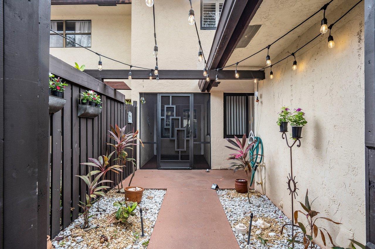 6850 Northwest 2nd Avenue, Unit 31 Boca Raton, FL 33487 - Photo 6 of 33 Private Courtyard Entry