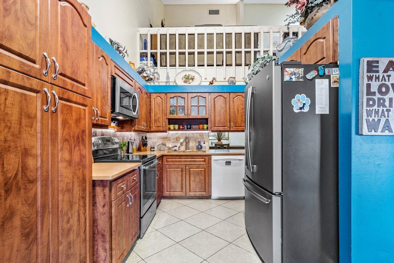 6850 Northwest 2nd Avenue, Unit 31 Boca Raton, FL 33487 - Photo 10 of 33 Pantry w/ Pull-out Shelves