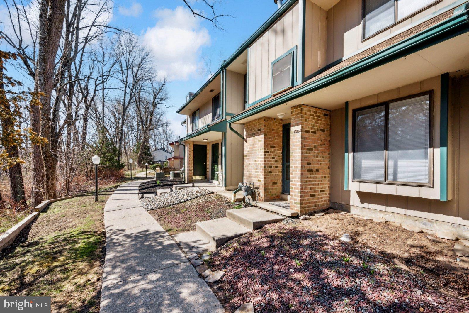 1004 Timber Creek Road Clementon, NJ 08021 - Photo 22 of 24 a view of a house with snow on the side of the road