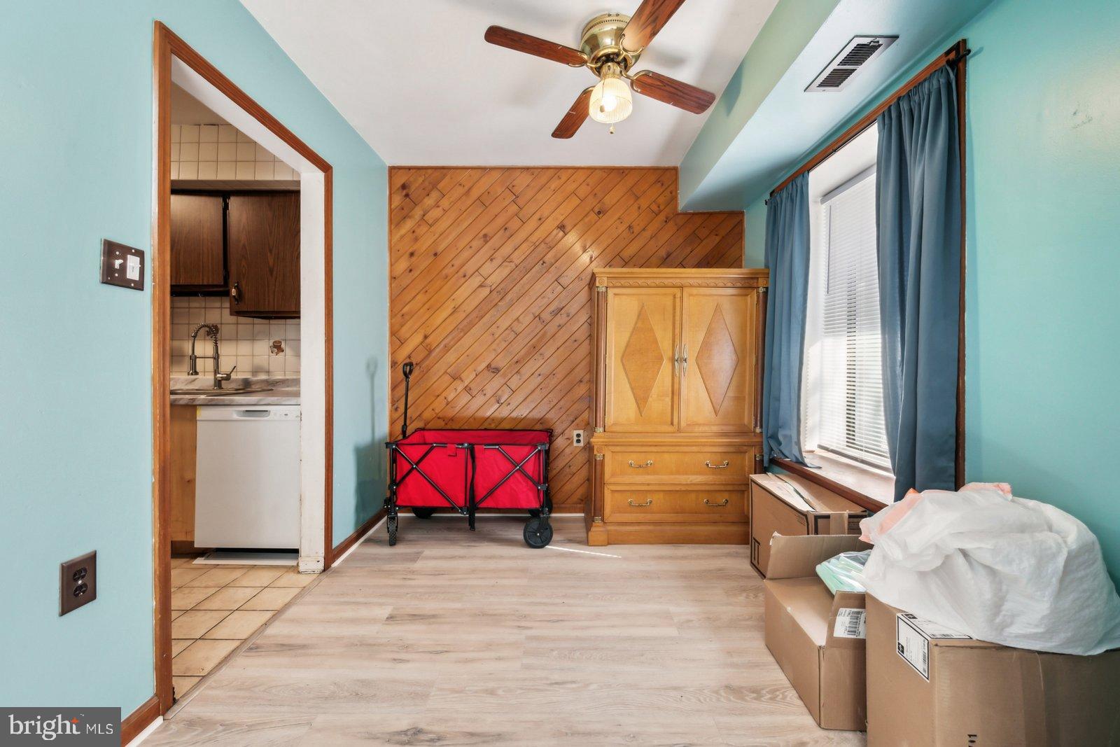 1004 Timber Creek Road Clementon, NJ 08021 - Photo 9 of 24 a living room with furniture a rug and white walls