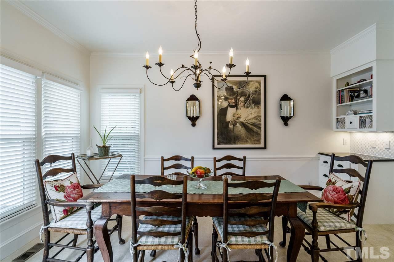 8509 Riddle Place Raleigh, NC 27615 - Photo 14 of 30 a view of a dining room with furniture
