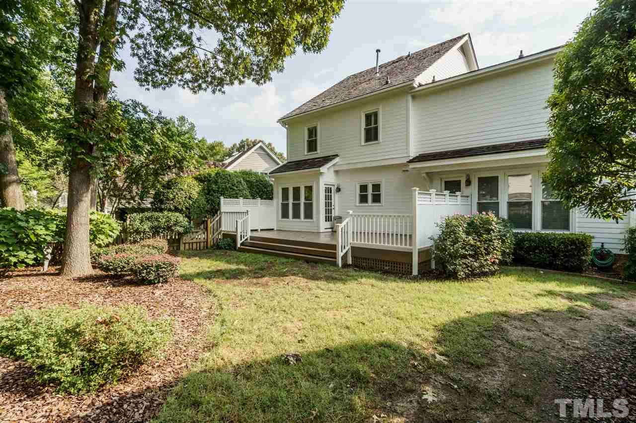 8509 Riddle Place Raleigh, NC 27615 - Photo 28 of 30 a view of a house with a yard